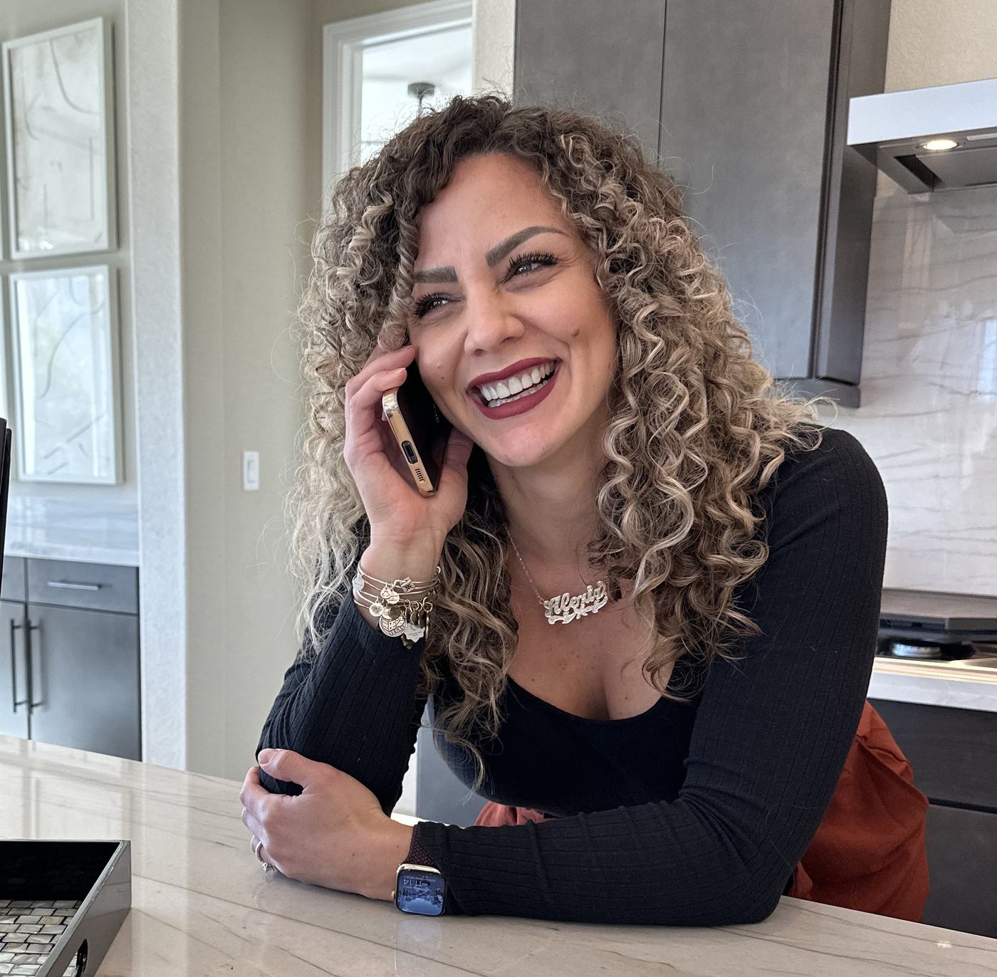 Alexis Scicchitano, Broker-Owner of Marvel Mortgage, taking a client call